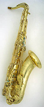 Vintage French sound. Rolled tone holes. Gold lacquer. Flared bell. Abalone key touches. Super Jazz VI neck. Extra hand engraving on bell & bow. Double arms on low B & C keys